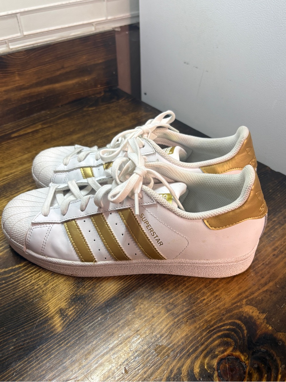 Adidas white and gold superstar sneakers size 7
